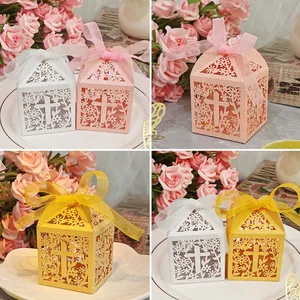 Elegant laser-cut hollow candy gift box with floral cross pattern and sheer ribbon bow decoration