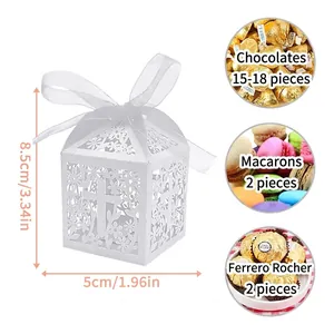 White hollow-out floral cross paper candy box with ribbon and dimension markings