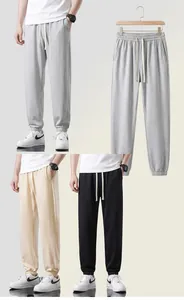 Men's loose cotton joggers for summer, stylish drawstring sweatpants for casual wear.