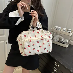 Large capacity cream corduroy travel bag with red strawberry pattern for women
