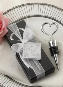Heart-shaped chrome wine bottle stopper in black gift box with white ribbon bow