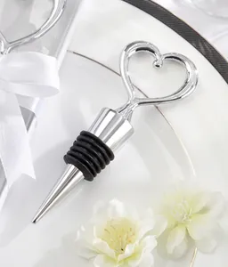 Detailed view of elegant silver heart-shaped wine stopper with tiered rubber seal