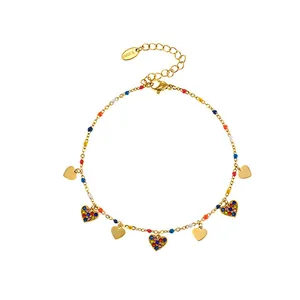 Elegant gold anklet featuring colorful heart charms and sparkling rhinestone accents