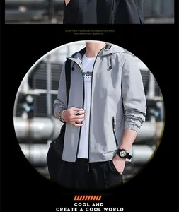 Detail view of a men's lightweight grey hooded jacket for spring and autumn wear