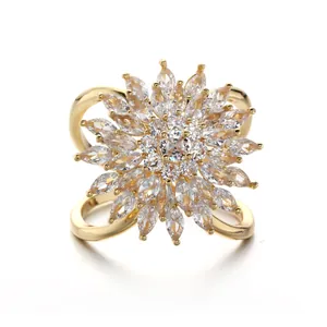 Elegant gold floral scarf buckle with marquise cubic zirconia sunburst design