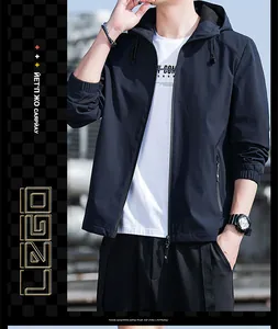 Stylish slim-fit navy blue hooded jacket for men in a casual outdoor fashion detail