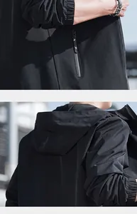 Vistas detalladas de chaqueta ligera negra con capucha para hombre y bolsillo con cremallera.