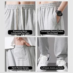 Men's casual grey thin cotton joggers featuring drawstring waist and elastic cuffs.