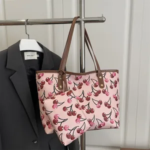Élégant sac cabas rose à imprimé cerises, grande capacité avec une pochette assortie