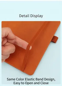 Close-up detail showing the matching elastic strap of the A5 minimalist notebook.