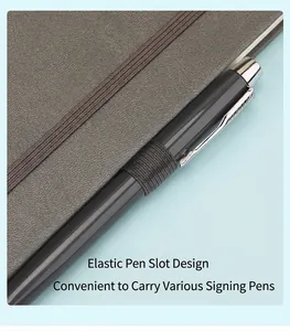 Close-up detail of the built-in elastic pen holder on a professional grey textured A5 notebook
