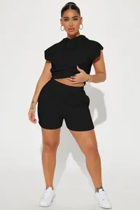 Stylish black two-piece streetwear set with sleeveless hoodie and matching shorts