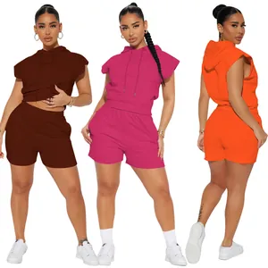 Detailed view of trendy women's sleeveless hoodie and shorts leisure set in vibrant colors.
