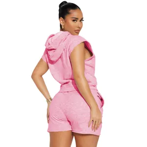 Women's pink two-piece casual set featuring a sleeveless hoodie and matching shorts.
