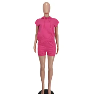 Front view detail of a vibrant pink sleeveless hoodie and shorts leisure set for women
