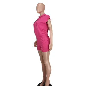 Side view of a vibrant pink sleeveless hoodie and shorts two-piece casual women's set