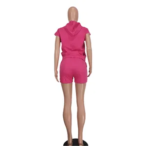Back view of a women's rose red sleeveless hooded top and shorts lounge casual set.