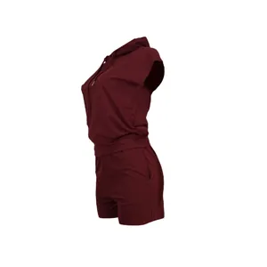 A detailed side profile of a burgundy sleeveless hoodie and matching shorts set.