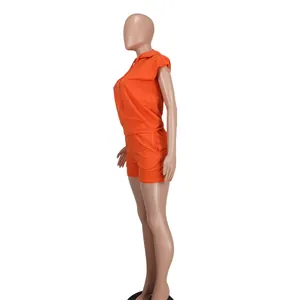 Detailed side view of a vibrant orange sleeveless hoodie and matching shorts outfit