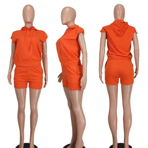 Multiple views of an orange sleeveless hooded top and shorts set on a mannequin