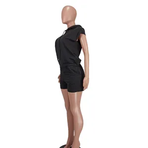 Side view of black sleeveless hoodie and matching shorts set for a casual street style.