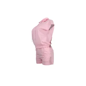 Side view of pink sleeveless hooded two-piece shorts set for women in casual style