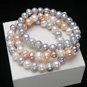 Lustrous multi-colored 8-9mm natural freshwater pearl bracelets on a white display box