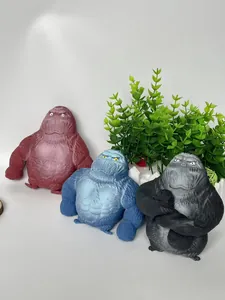 Set of three gorilla stress relief squeeze toys in red, blue, and black colors