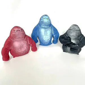Detailed view of three colorful gorilla-shaped stress relief squeeze toys in red blue and black