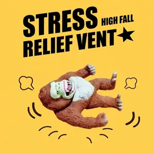 Action shot of a brown gorilla squeeze toy for stress relief on yellow background