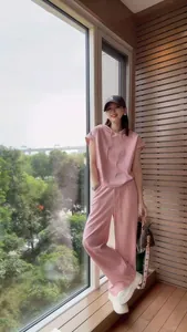 Women's chic casual oversized pink 2-piece tracksuit set with hoodie and stylish wide-leg pants
