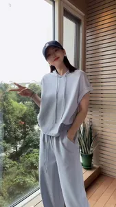 Stylish women's loose casual sports two-piece set in light blue for summer outings