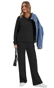Elegant black two-piece lounge set for women featuring long sleeve top and wide pants