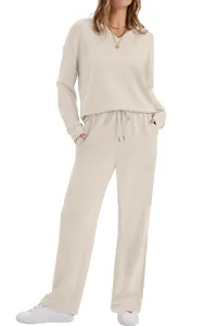 Full view of women's beige long-sleeve V-neck loungewear set with drawstring pants.