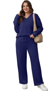 Detailed view of women's navy blue lounge set featuring V-neck top and drawstring pants