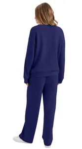 Back view of women's navy blue two-piece lounge set with long sleeve sweatshirt