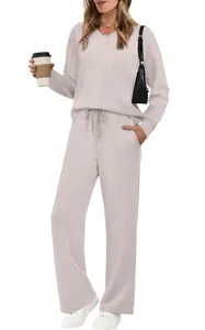Two-piece solid color loungewear set with V-neck sweatshirt and drawstring pants.