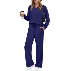 Comfortable navy blue two-piece loungewear set with V-neck top and drawstring pants