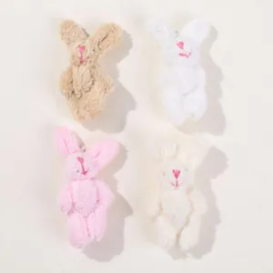 Set of four soft plush rabbit charms in assorted colors for DIY hair accessories