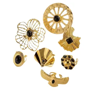 Set of vintage French style gold open rings with black stones and hollow designs