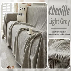 Close-up of luxury light grey chevron chenille sofa cover with stain-resistant texture.