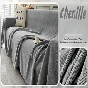 Macro view of dark grey chenille sofa cover with luxury chevron pattern texture