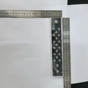 Detailed measurement photo showing dimensions of black star rivet leather bracelet