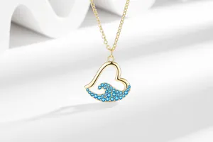 Fashionable gold-plated heart and blue wave pendant necklace for women in minimalist style