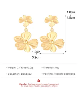 Large gold flower drop earrings for women made of alloy with size and weight details.