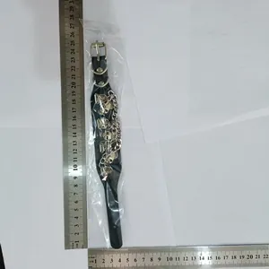 Detailed size measurement of a black punk PU leather bracelet with skull charms.