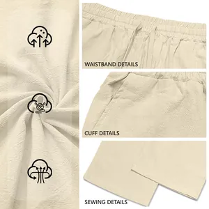 Detailed view of men's beige breathable linen trousers showing waistband and stitching