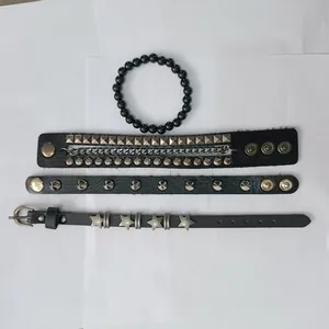 Detailed view of 4-piece punk style black leather and beaded bracelet set for men