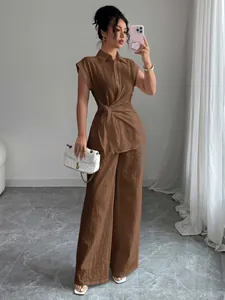 Elegant brown short-sleeved shirt and wide-leg pants set with stylish waist tie detail