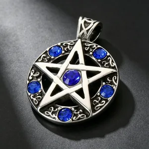 Detail shot of a vintage titanium steel pentagram pendant featuring blue gemstones